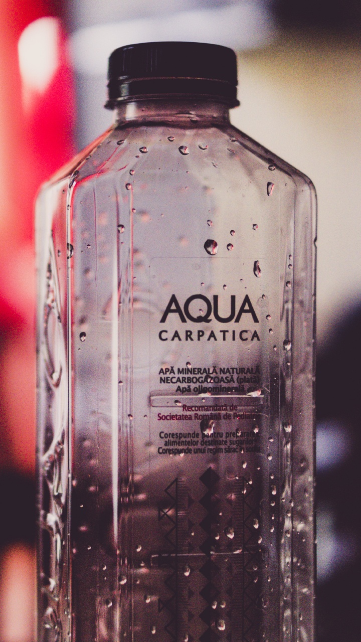 Clear Plastic Bottle With Water. Wallpaper in 720x1280 Resolution