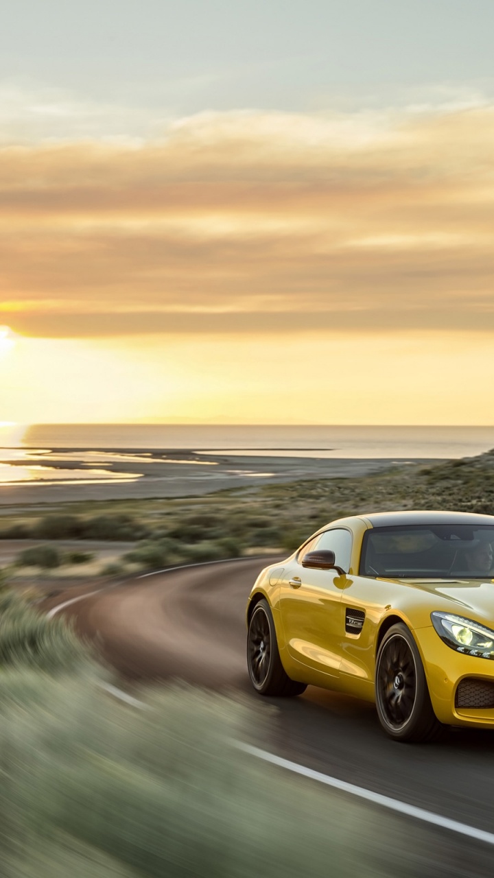 Yellow Porsche 911 on Road During Sunset. Wallpaper in 720x1280 Resolution