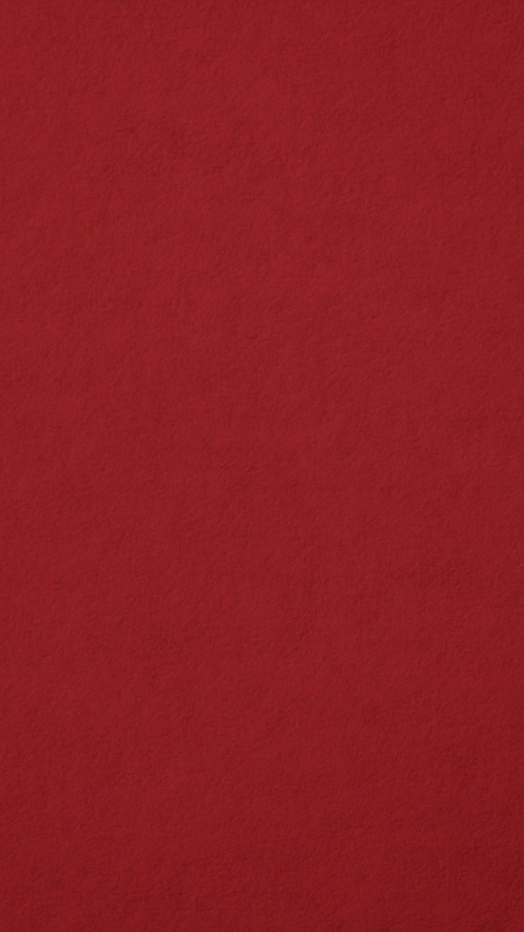Rotes Textil Auf Braunem Holztisch. Wallpaper in 750x1334 Resolution
