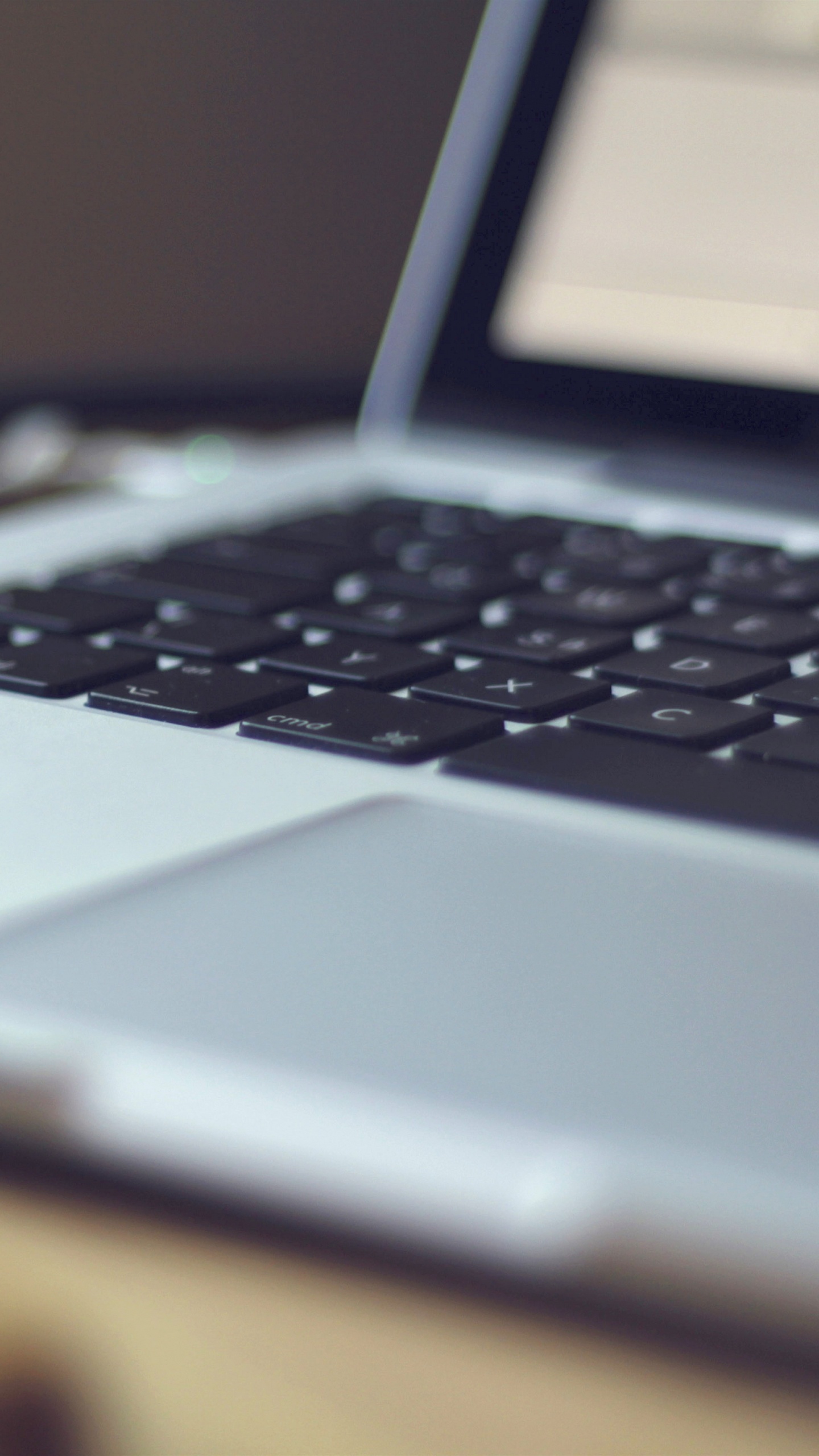 Macbook Pro on Brown Wooden Table. Wallpaper in 1440x2560 Resolution