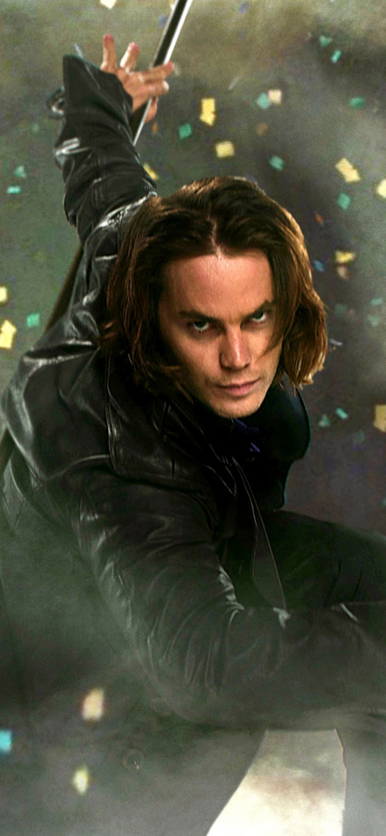 Woman in Black Jacket Holding a Stick. Wallpaper in 1242x2688 Resolution