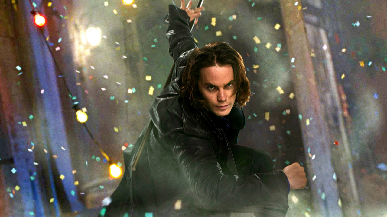 Woman in Black Jacket Holding a Stick. Wallpaper in 1280x720 Resolution