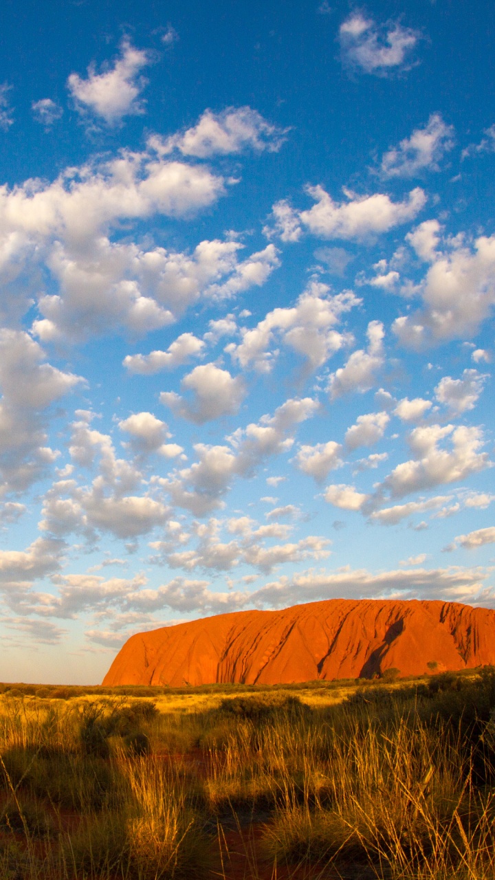 Brown Mountain Under Blue Sky and White Clouds During Daytime. Wallpaper in 720x1280 Resolution