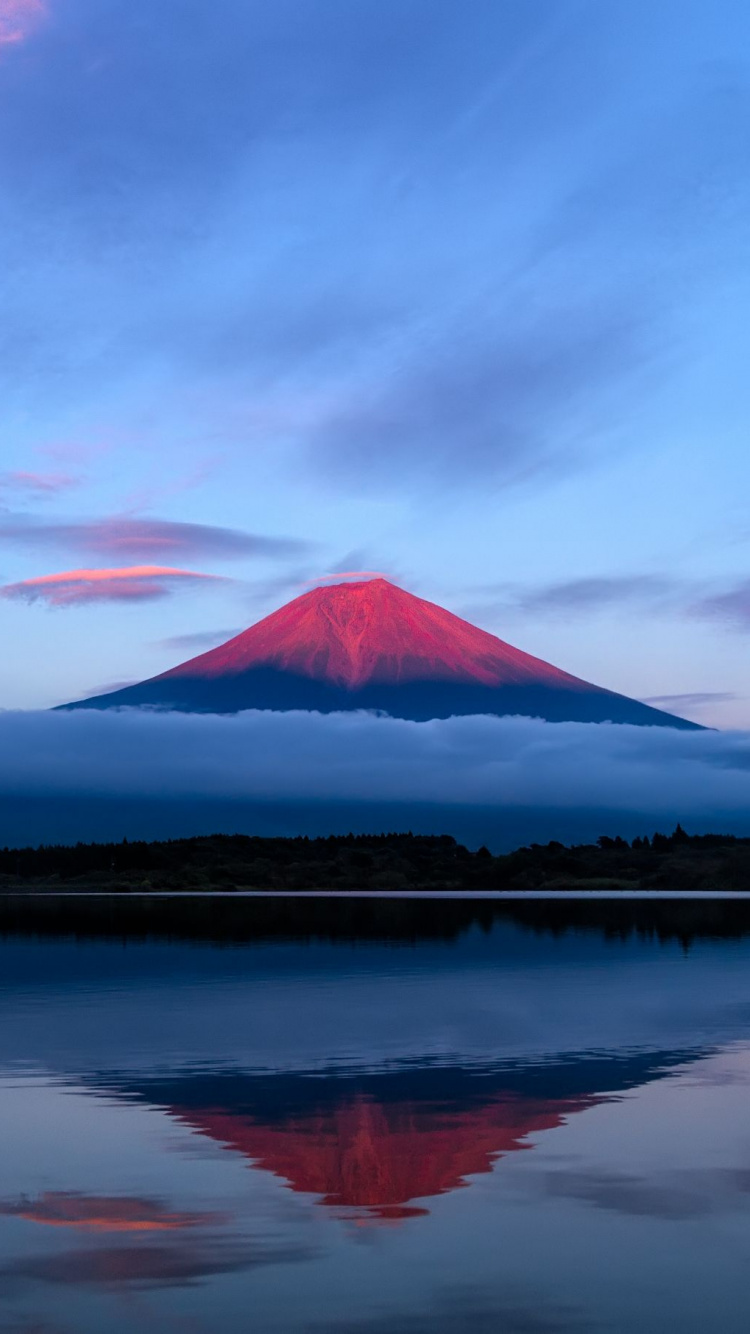 Body of Water Near Mountain Under Blue Sky During Daytime. Wallpaper in 750x1334 Resolution
