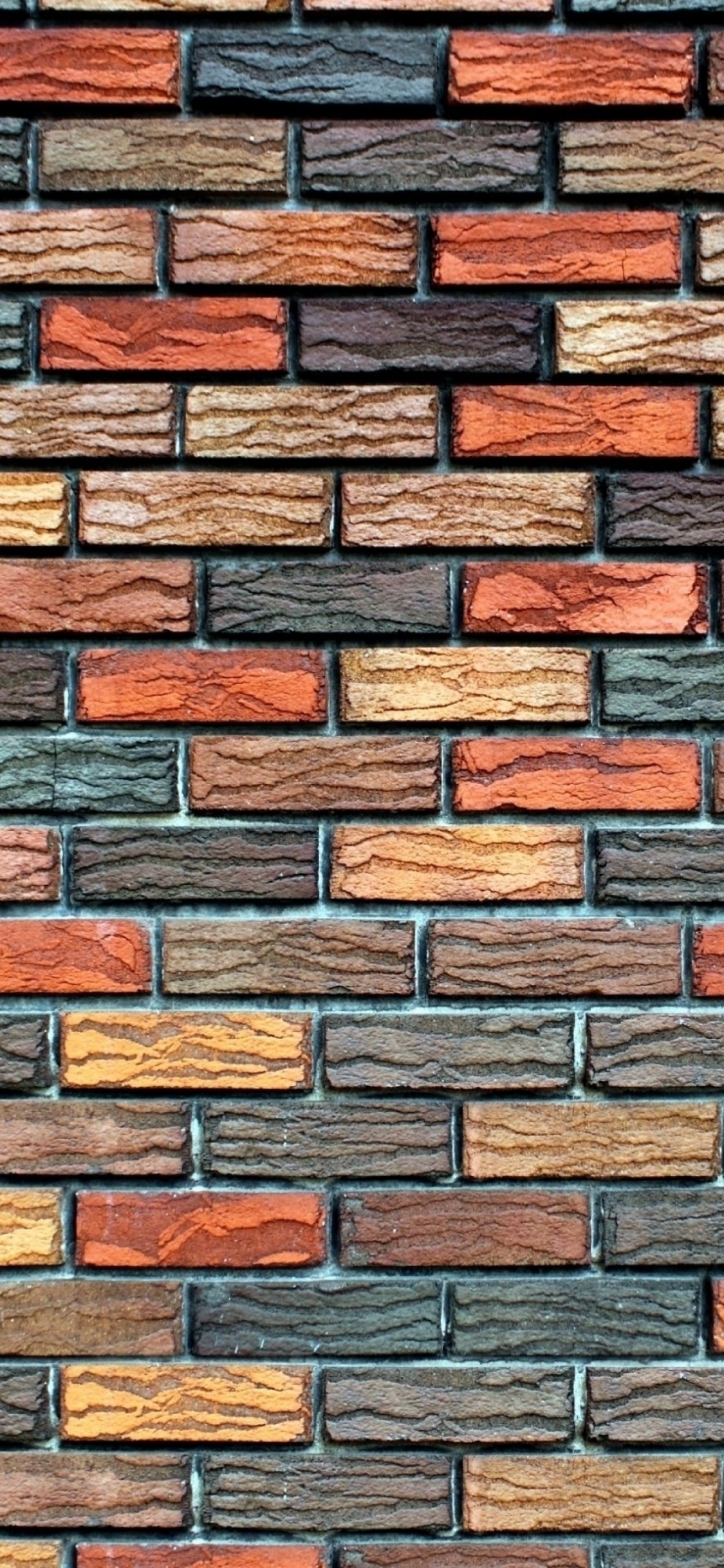 Braune Und Schwarze Mauer. Wallpaper in 1125x2436 Resolution