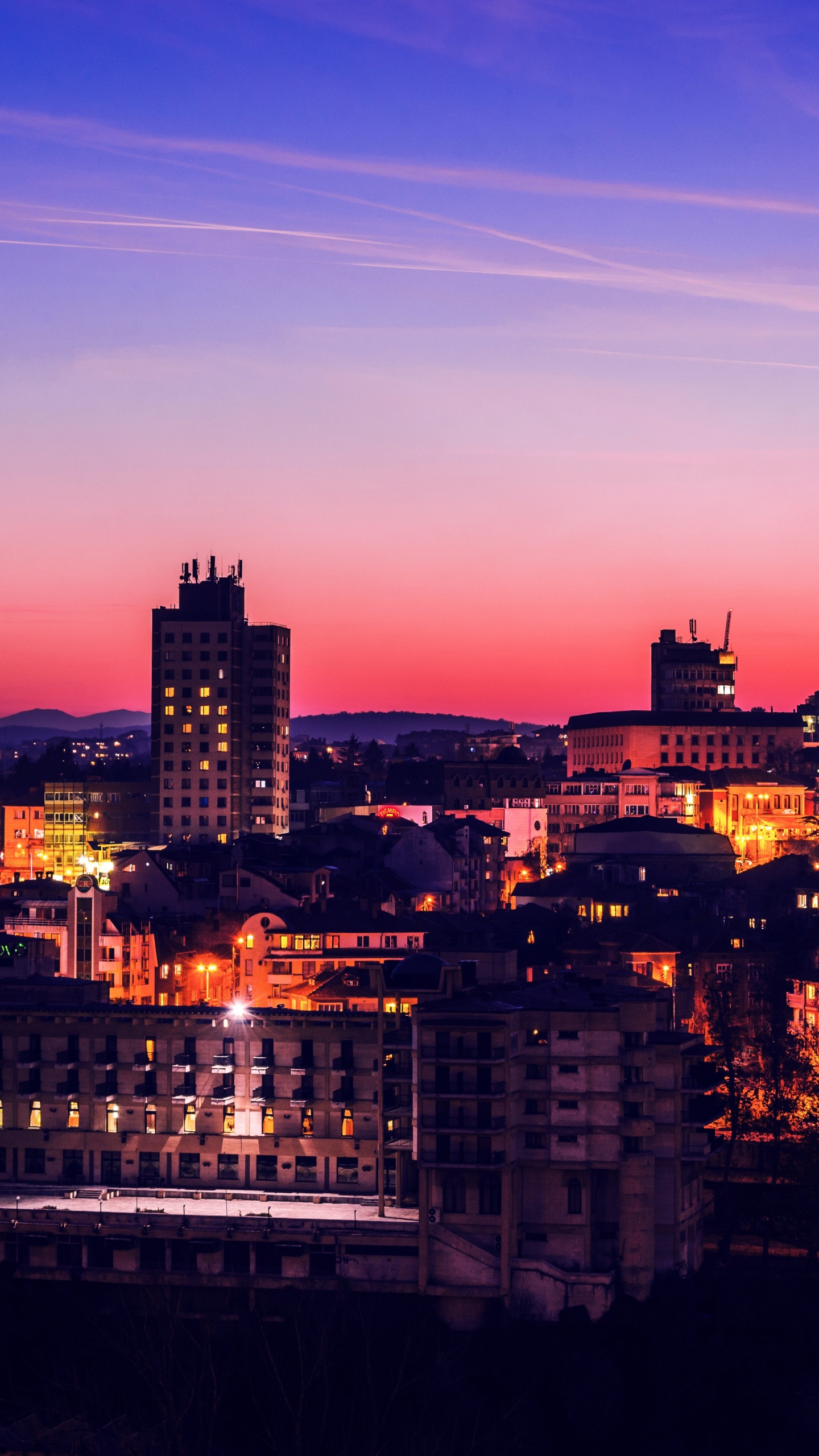 City Skyline During Night Time. Wallpaper in 1440x2560 Resolution