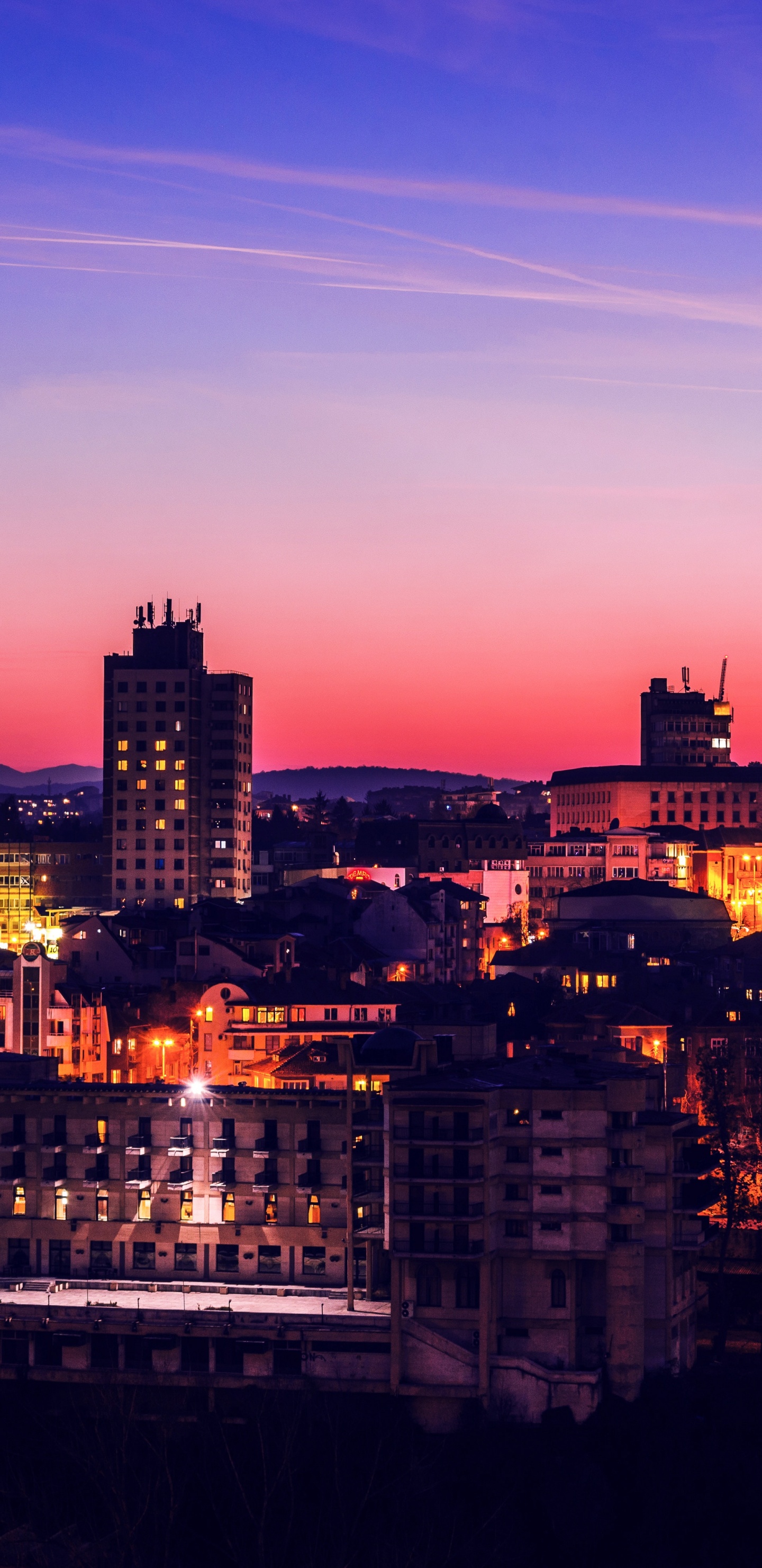 City Skyline During Night Time. Wallpaper in 1440x2960 Resolution