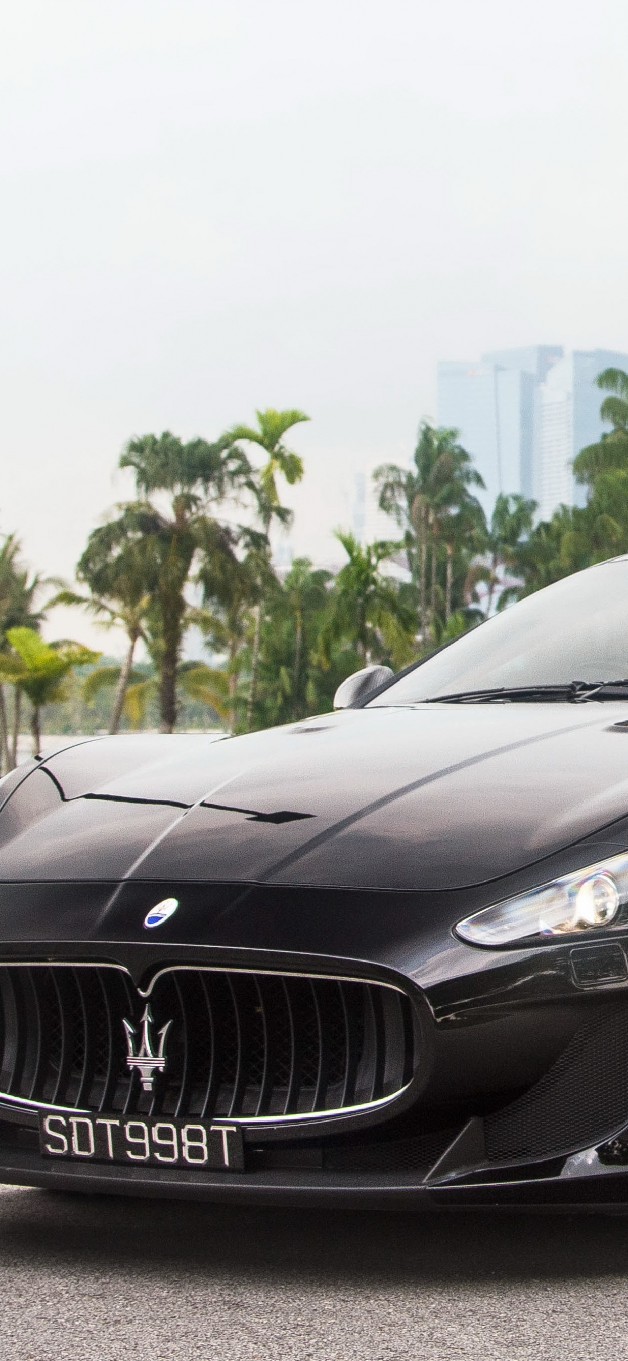 Black Mercedes Benz Coupe on Gray Asphalt Road During Daytime. Wallpaper in 1242x2688 Resolution