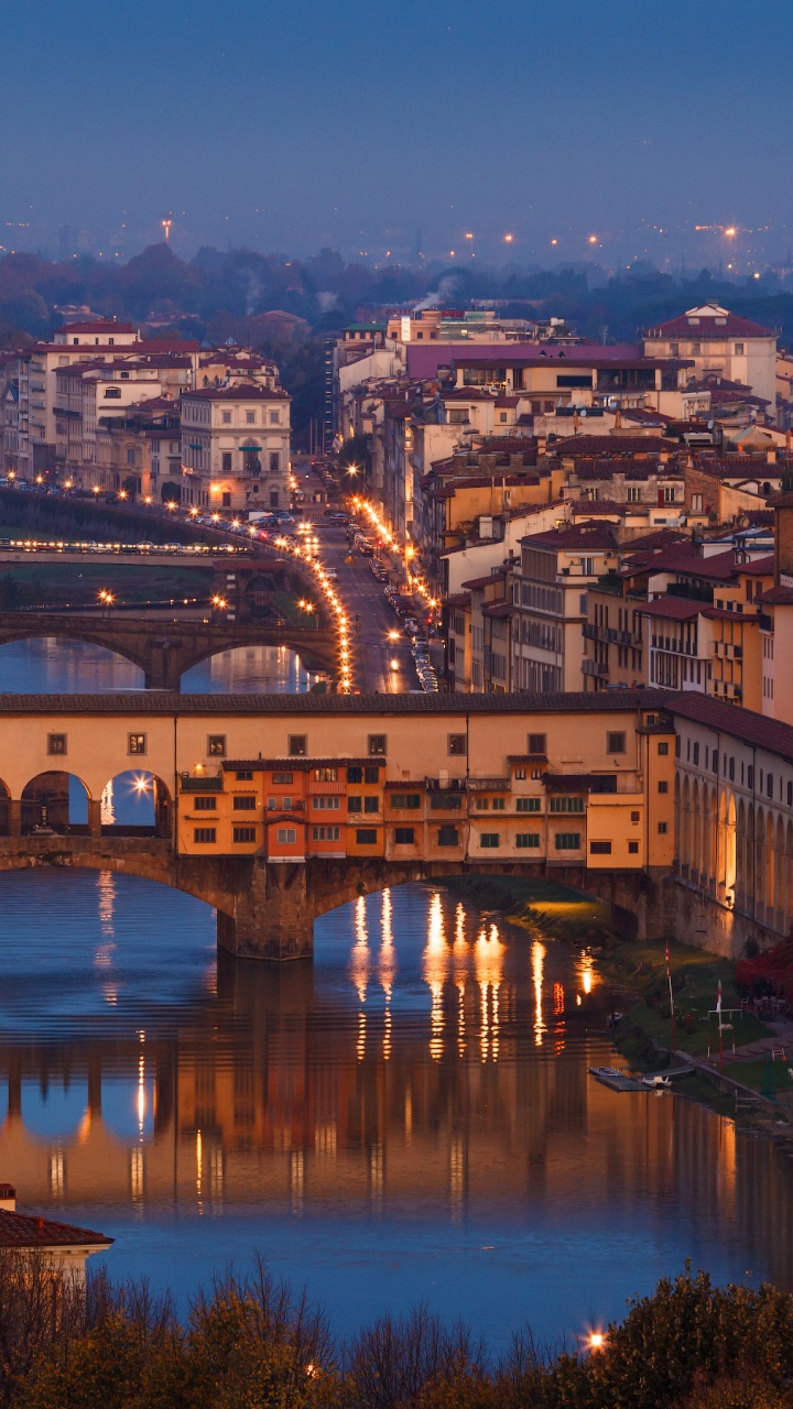 Brown Concrete Bridge Over River During Night Time. Wallpaper in 720x1280 Resolution