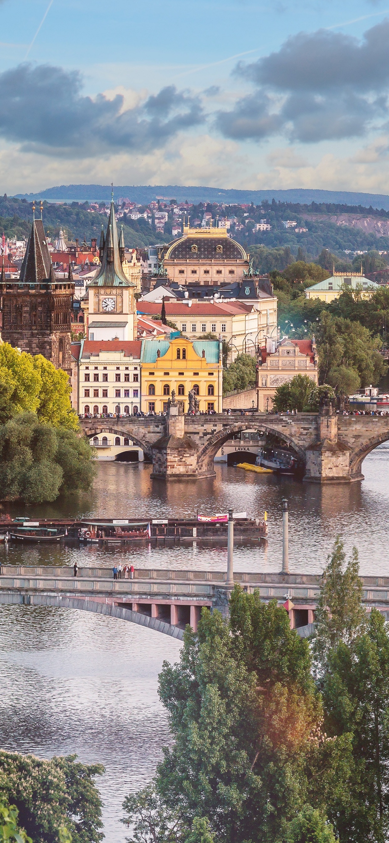Brown Concrete Bridge Over River During Daytime. Wallpaper in 1242x2688 Resolution