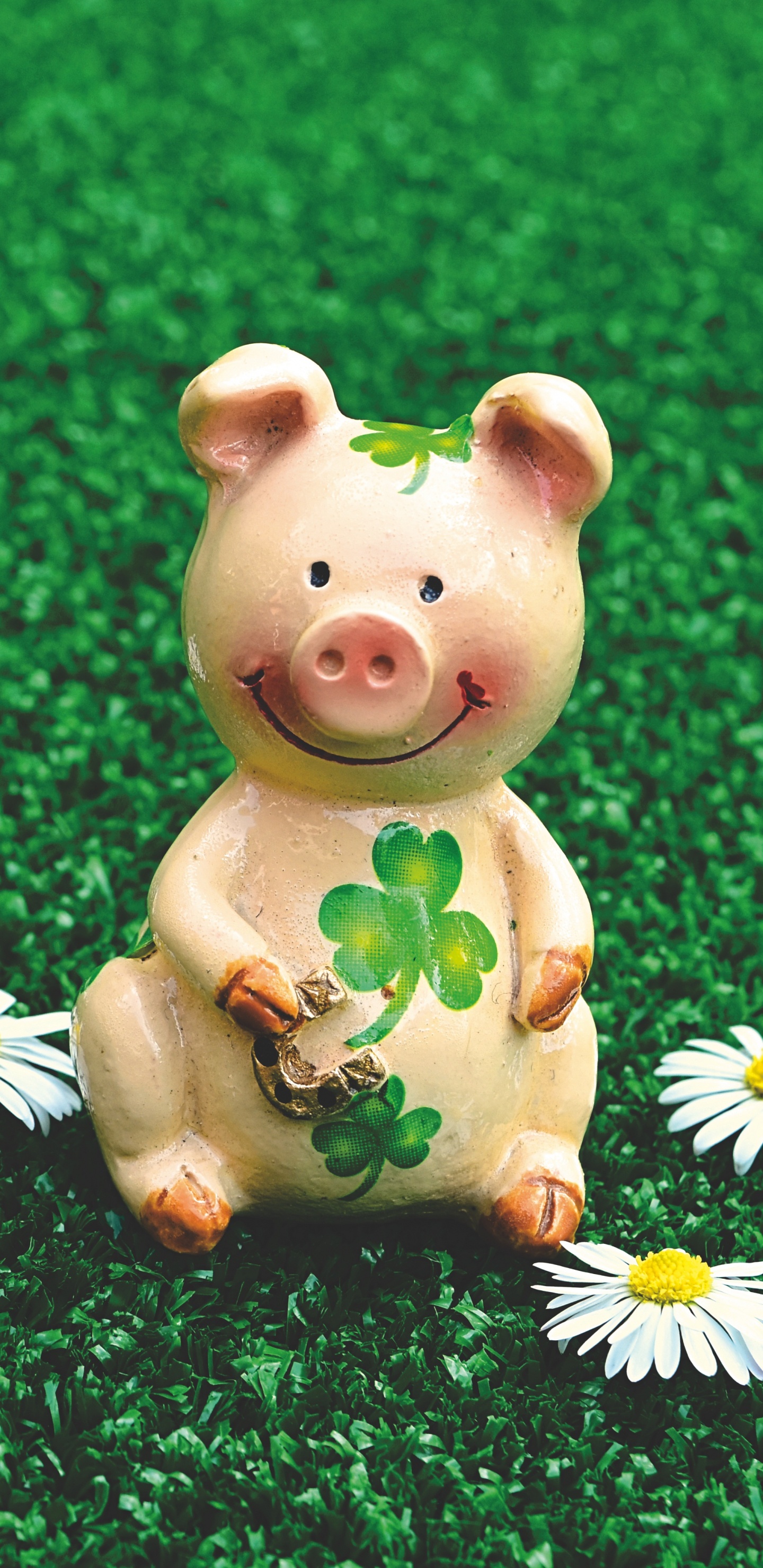 Pink Pig Ceramic Figurine on Green Grass Field. Wallpaper in 1440x2960 Resolution