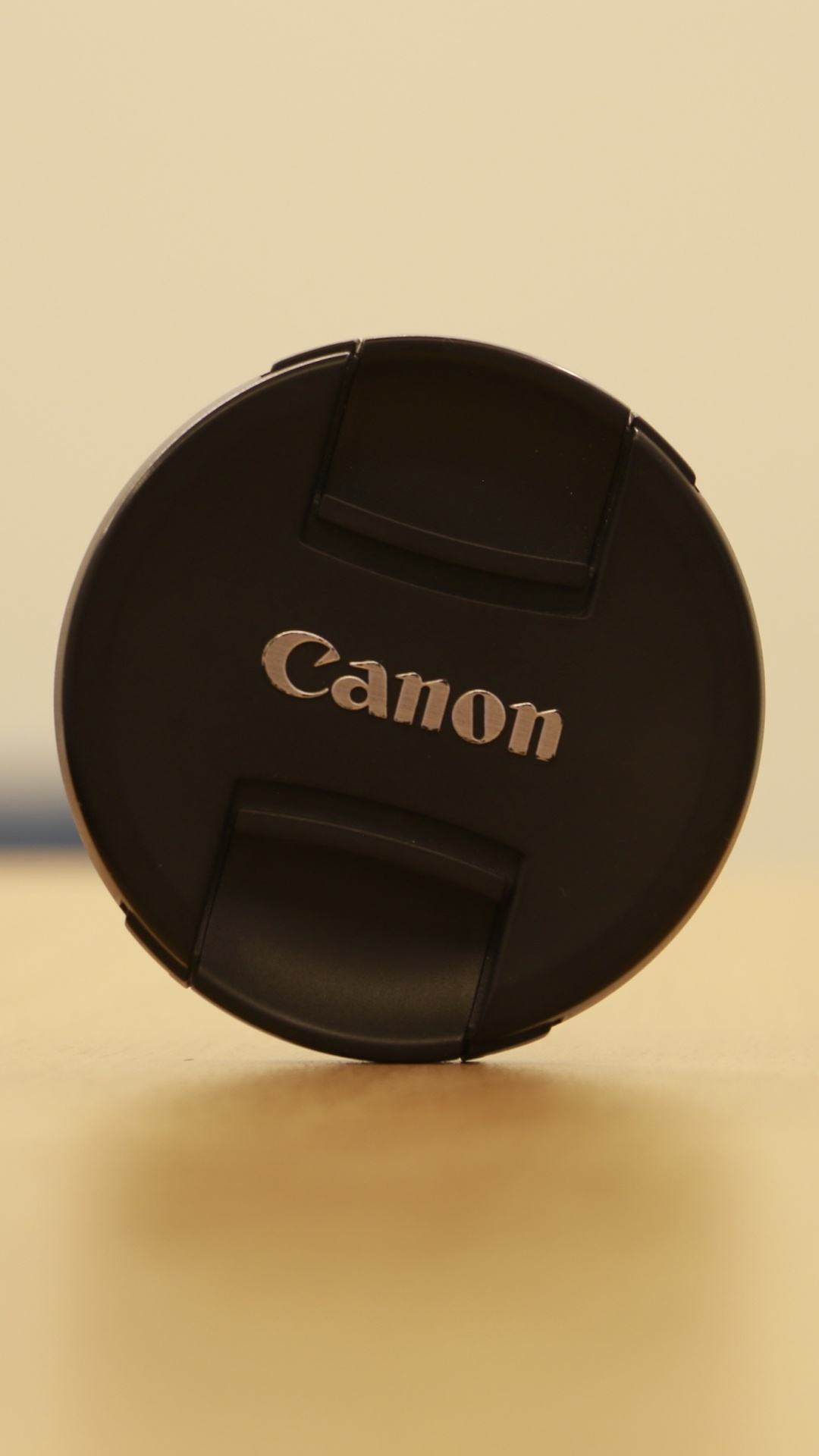 Black Nikon Camera Lens Cover. Wallpaper in 1080x1920 Resolution