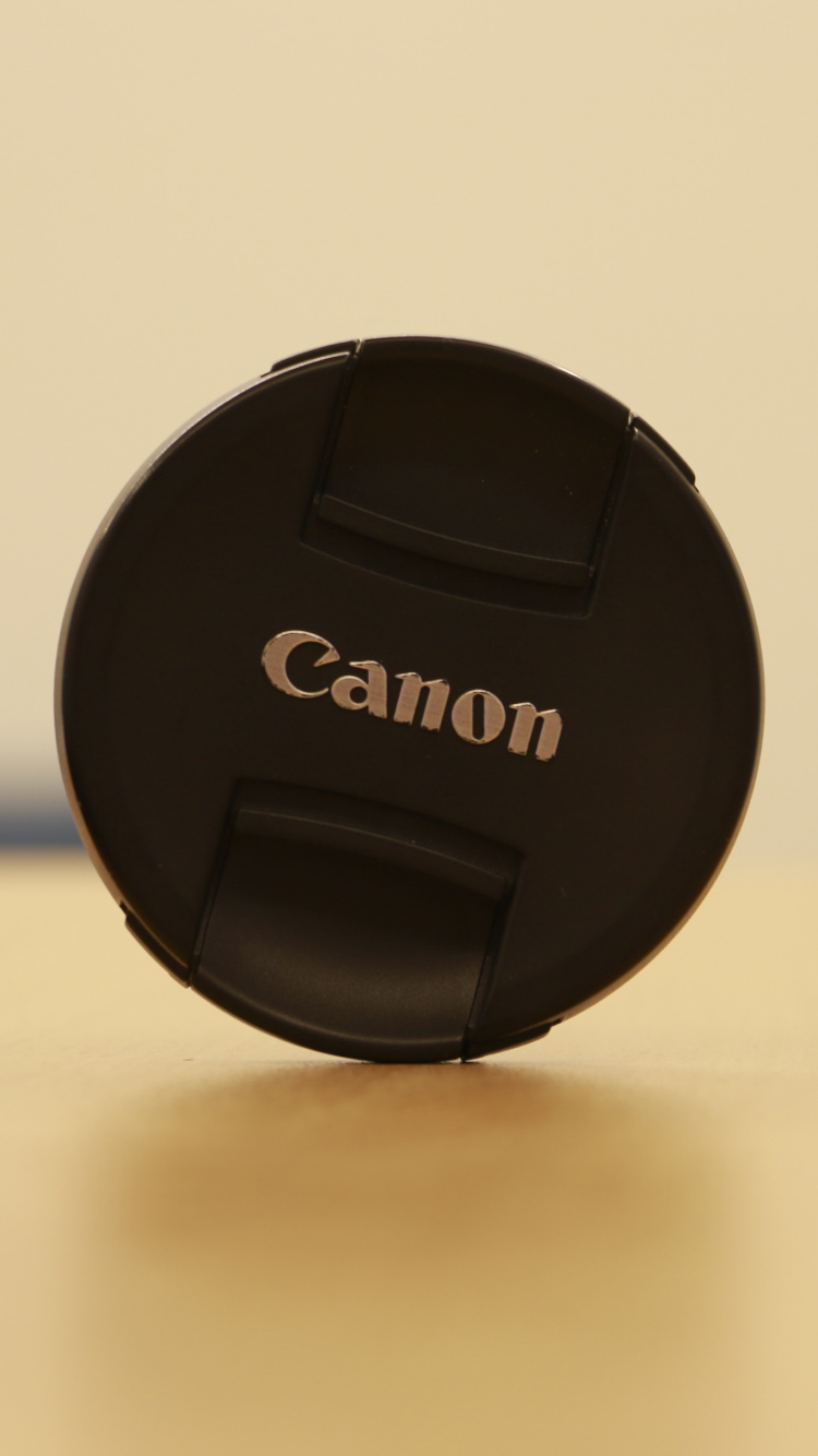 Black Nikon Camera Lens Cover. Wallpaper in 750x1334 Resolution
