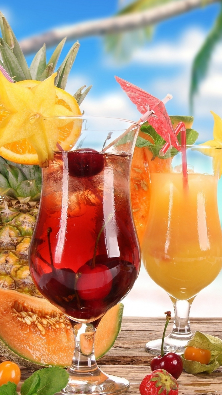 Verre à Vin Clair Avec Liquide Rouge et Citron Sur la Plage Pendant la Journée. Wallpaper in 750x1334 Resolution