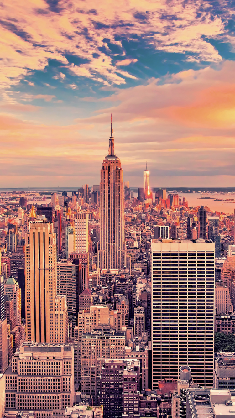 Aerial View of City Buildings During Sunset. Wallpaper in 750x1334 Resolution