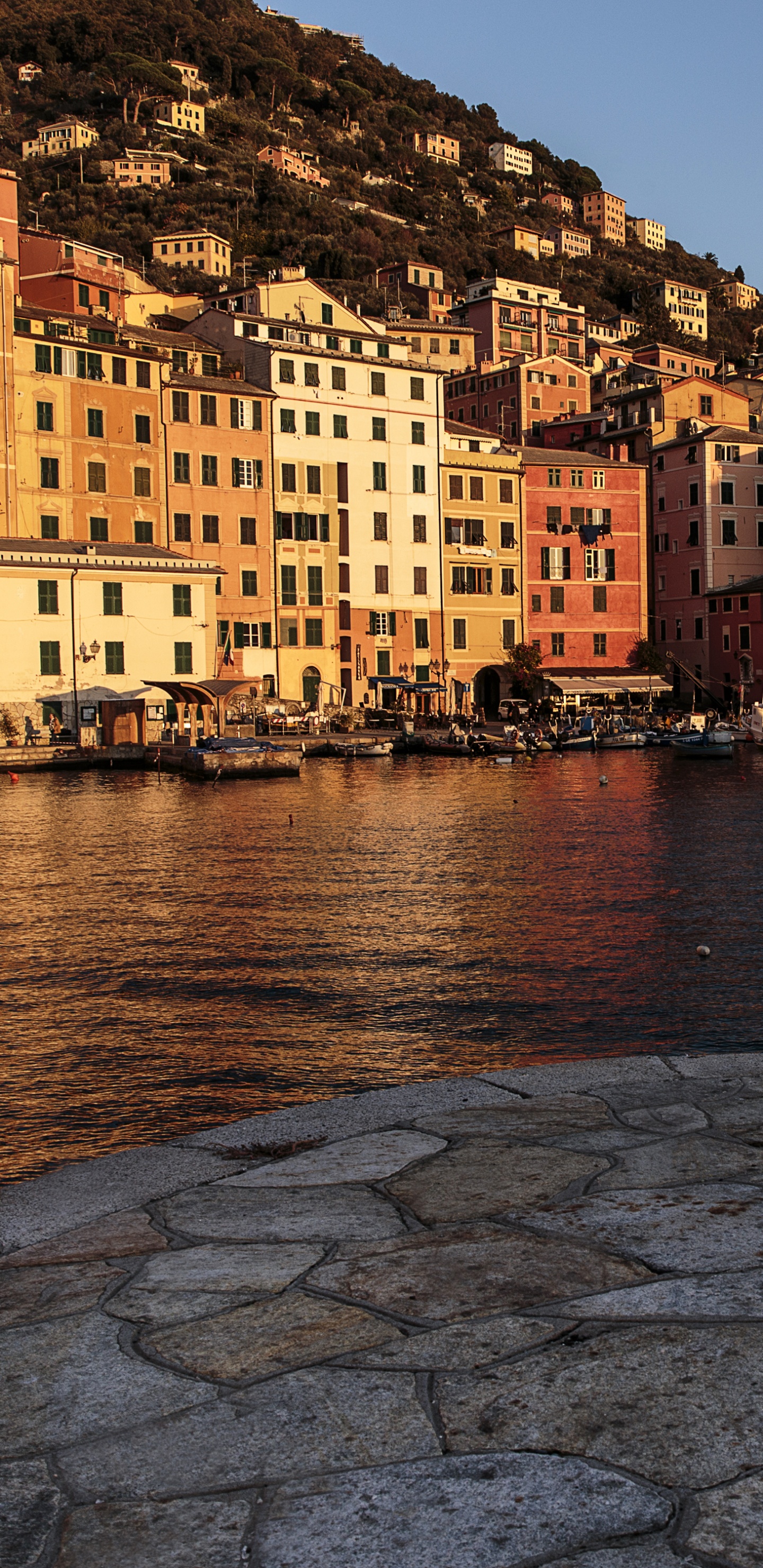 People Walking on Sidewalk Near Body of Water During Daytime. Wallpaper in 1440x2960 Resolution