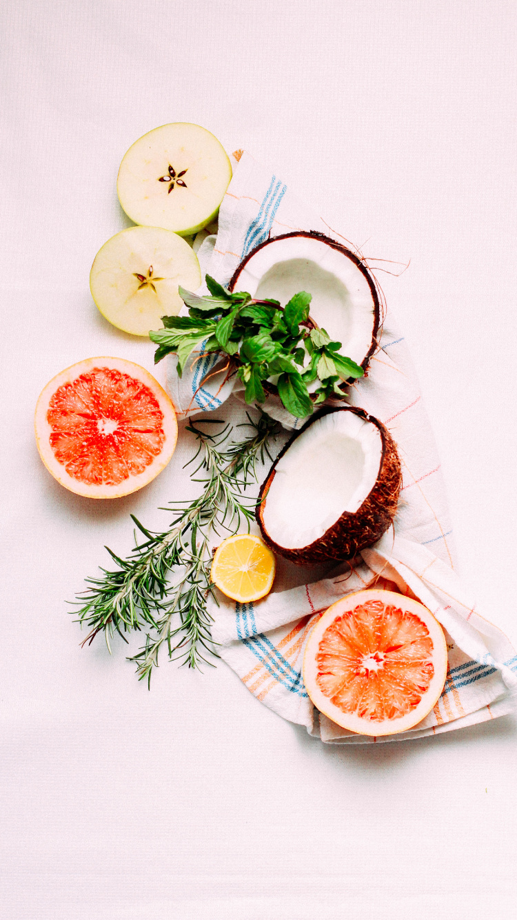 Sliced Orange Fruit on White Ceramic Plate. Wallpaper in 750x1334 Resolution