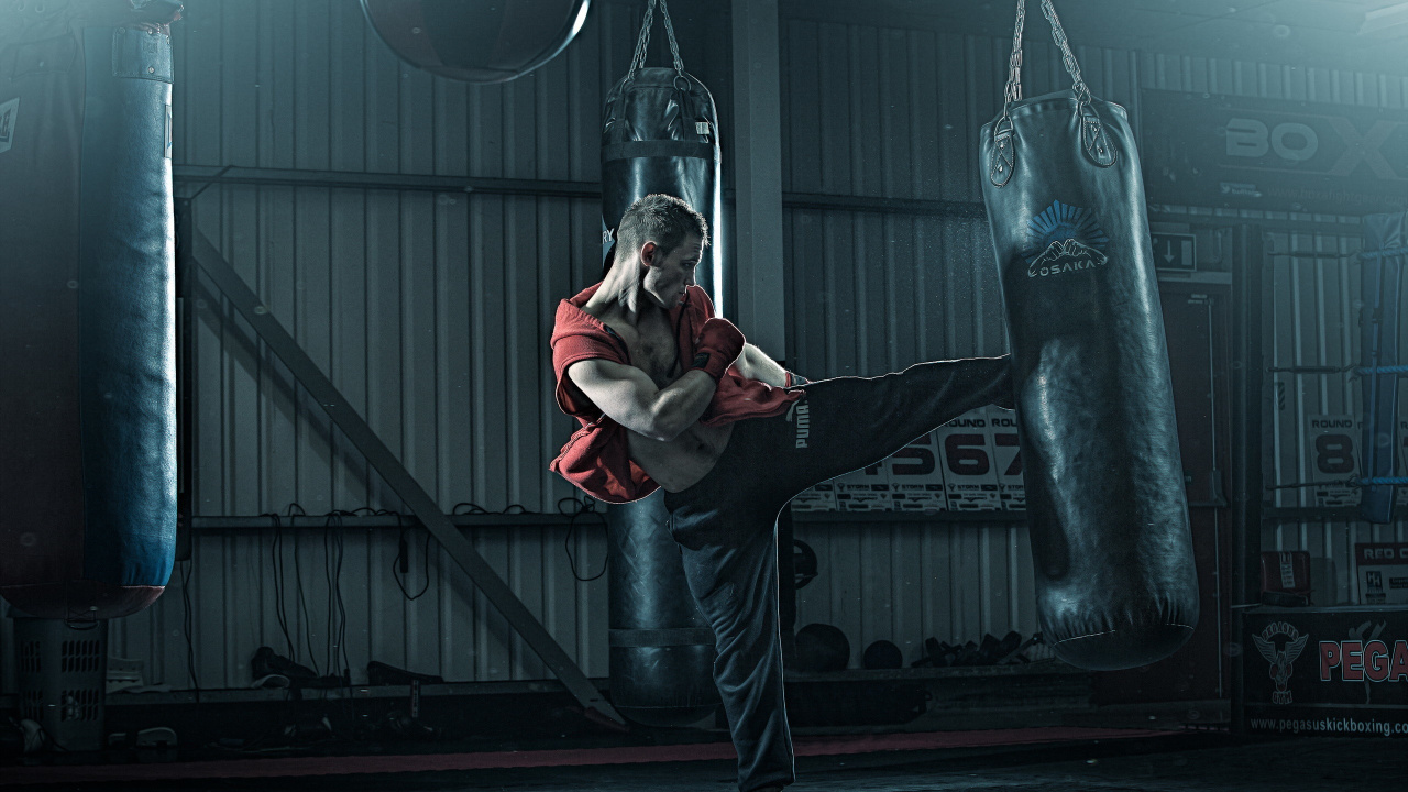 Man in Red and White Jacket and Blue Denim Jeans. Wallpaper in 1280x720 Resolution