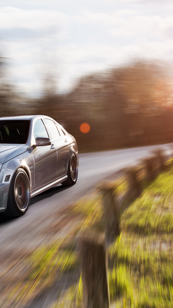 Silver Mercedes Benz Coupe on Road During Daytime. Wallpaper in 720x1280 Resolution