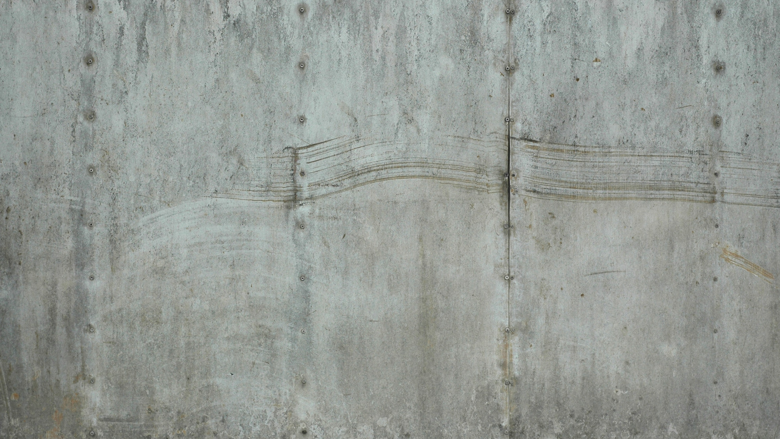Gray Concrete Wall With Black Paint. Wallpaper in 2560x1440 Resolution