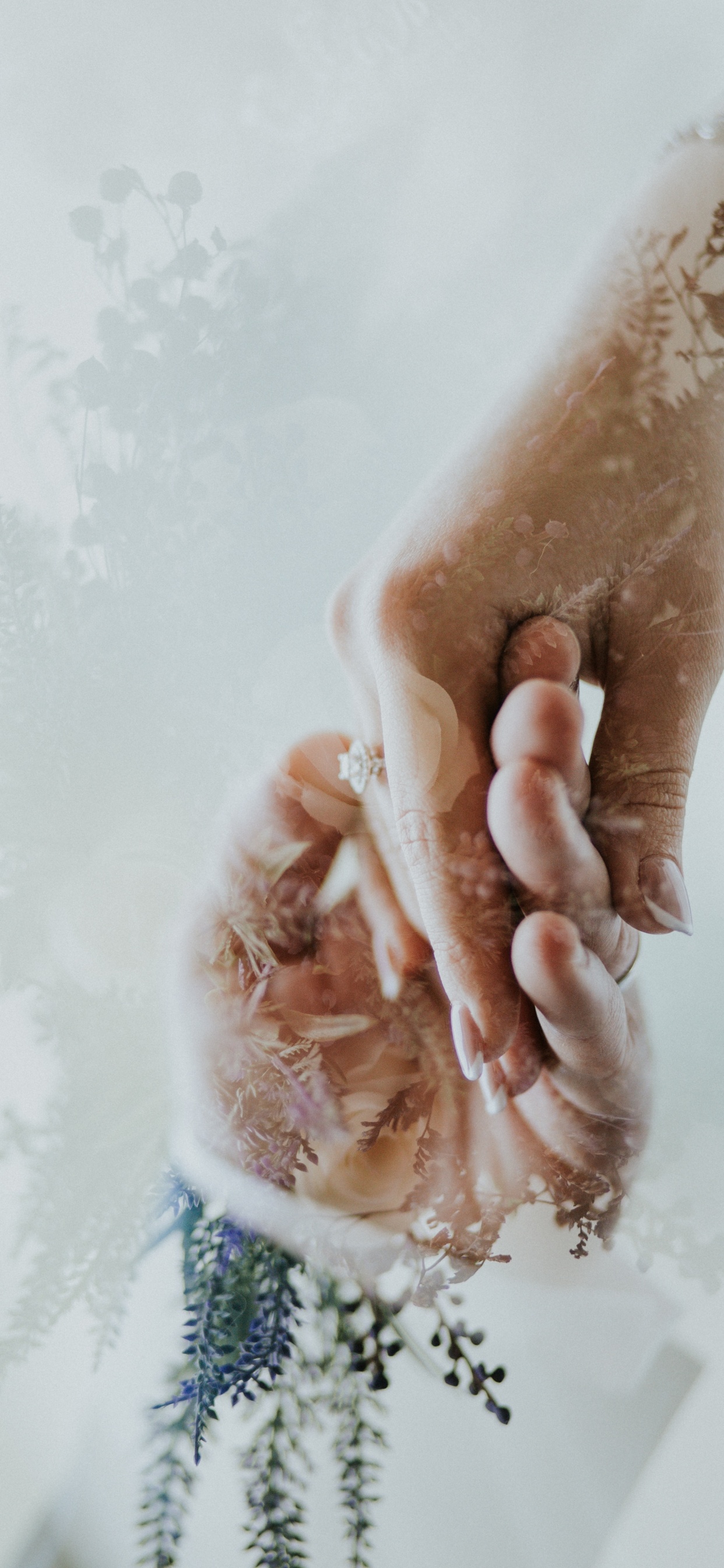 Person Holding White Textile With Brown Stain. Wallpaper in 1242x2688 Resolution