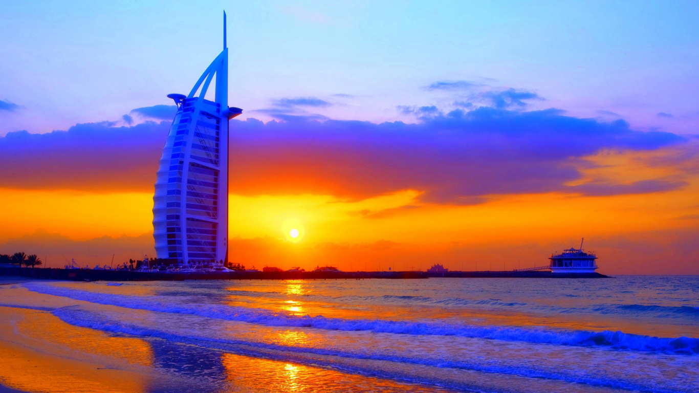 White and Black Building Near Body of Water During Sunset. Wallpaper in 1366x768 Resolution