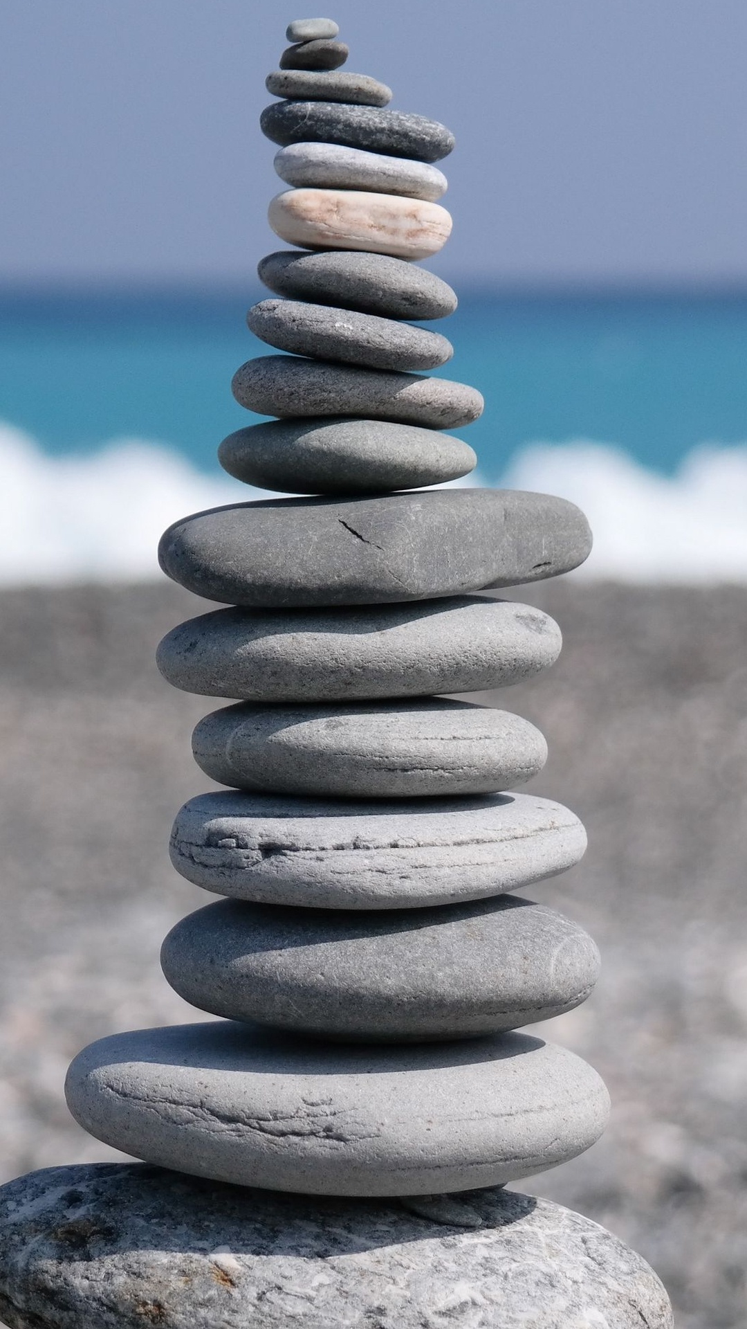 Pebble, Smartphone, Tablet, Automotive Tire, Azure. Wallpaper in 1080x1920 Resolution