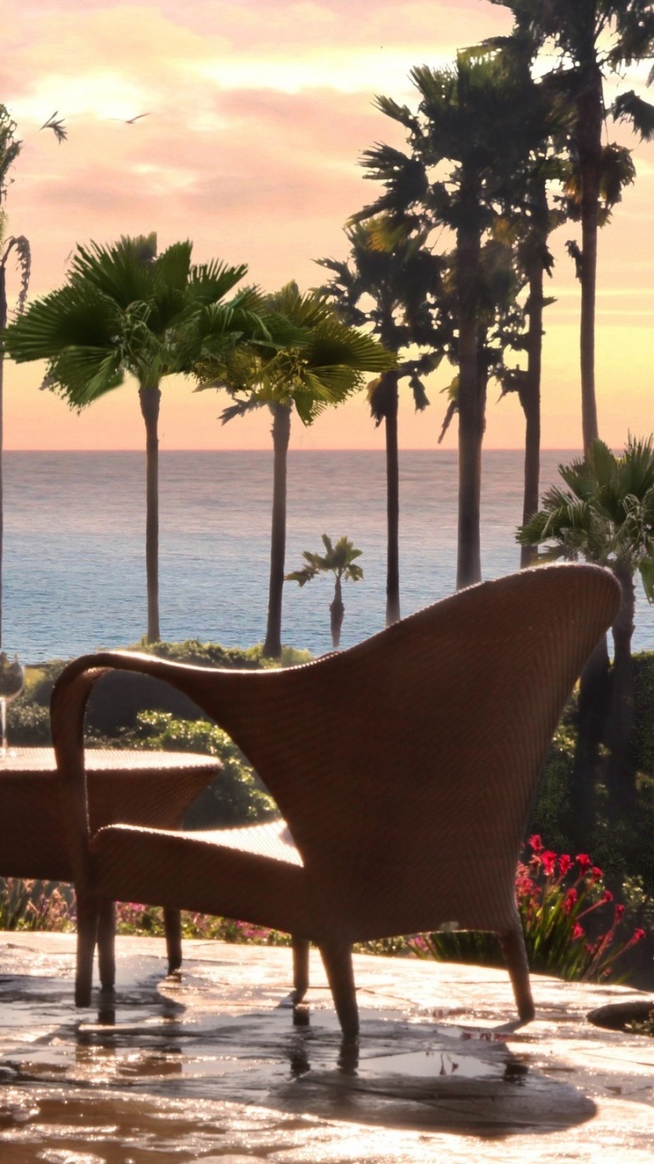 Brown Wooden Table and Chairs on Beach During Daytime. Wallpaper in 720x1280 Resolution
