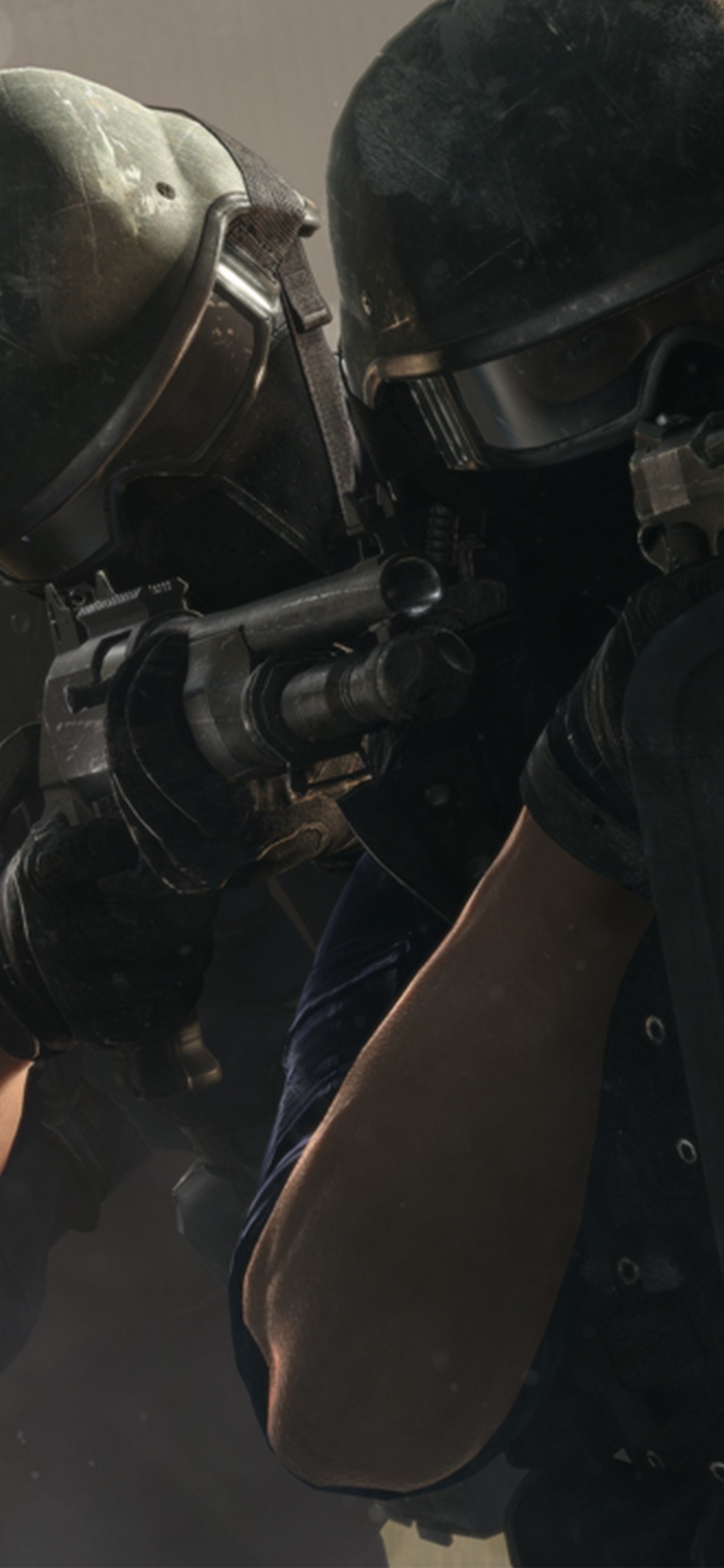 2 Men in Black Helmet and Black Helmet. Wallpaper in 1125x2436 Resolution