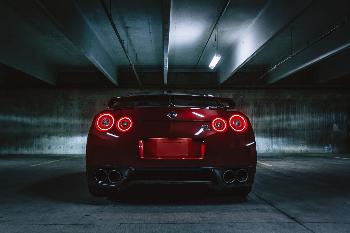 red car in a tunnel