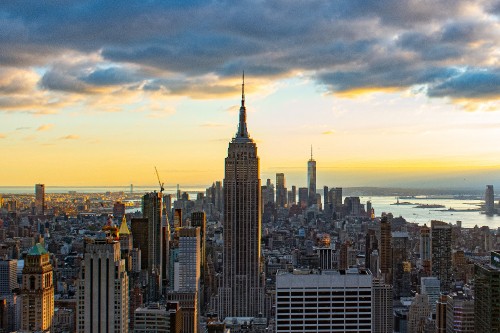 Image city skyline under blue sky during daytime