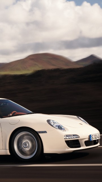 Image white porsche 911 on road during daytime