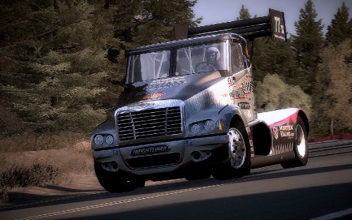 Image white and black ford truck on road during daytime