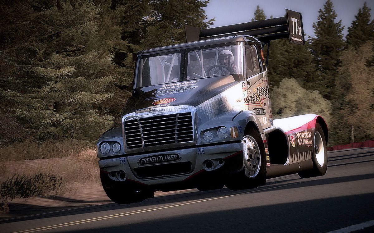 white and black ford truck on road during daytime