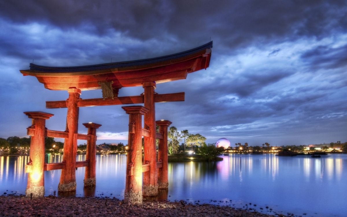 brown wooden arch on water