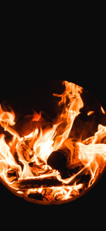 Image fire in black background with black background