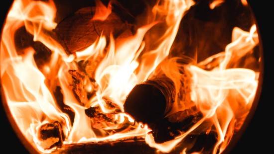 Image fire in black background with black background