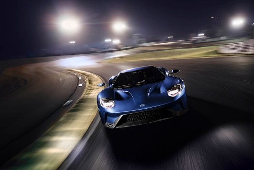 Image blue porsche 911 on road during night time