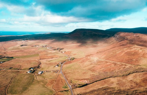 Image brown mountain under blue sky during daytime