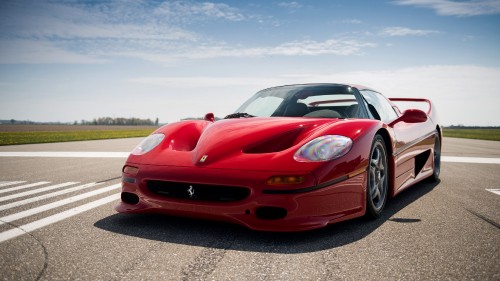 Image red ferrari 458 italia on road during daytime