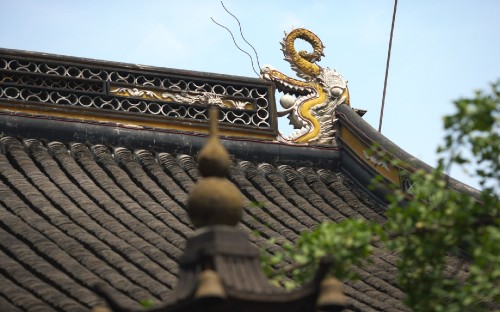 Image brown roof under blue sky during daytime