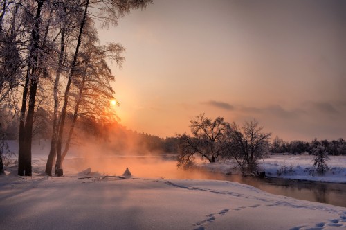 Image snow covered road during sunset