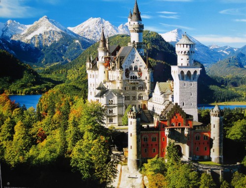 Image white and red concrete castle on hill