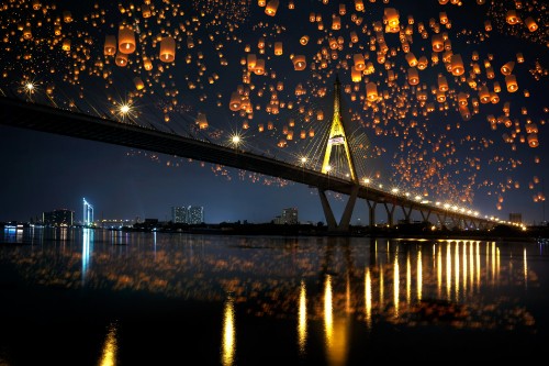 Image bridge with lights during night time