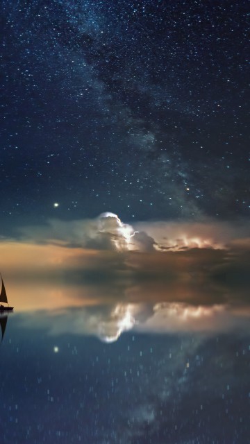 Image silhouette of person standing on boat on water under starry night