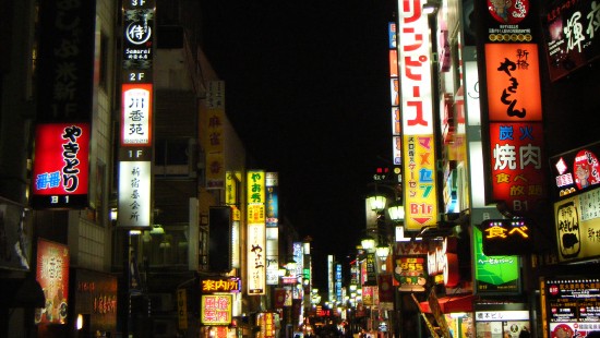 Image people walking on street during nighttime