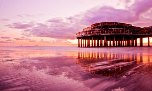 Image brown wooden dock on sea under white clouds during daytime