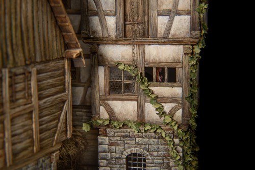 Image green plants on brown wooden house