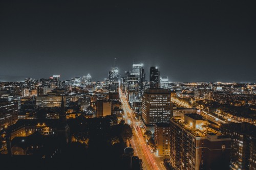 Image aerial view of city buildings during night time