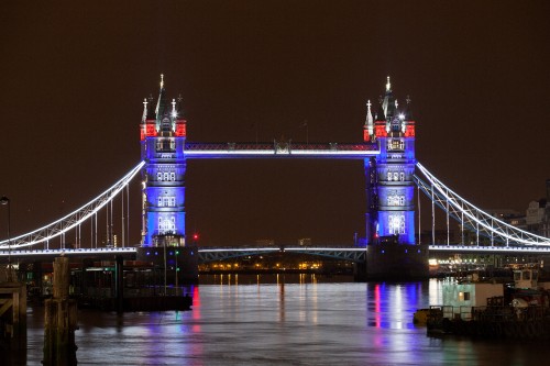 Image lighted bridge during night time